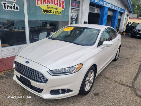 2014 Ford Fusion for sale at AutoMotion Sales in Franklin OH