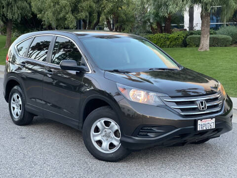 2013 Honda CR-V for sale at MILLENNIUM MOTORS in Van Nuys CA