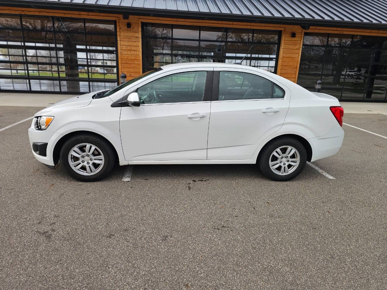 2014 Chevrolet Sonic for sale at WAGNER AUTO MART LLC in Ann Arbor, MI