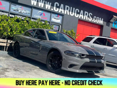 2019 Dodge Charger for sale at CARUCARS LLC in Miami FL