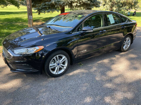 2018 Ford Fusion Hybrid for sale at BELOW BOOK AUTO SALES in Idaho Falls ID