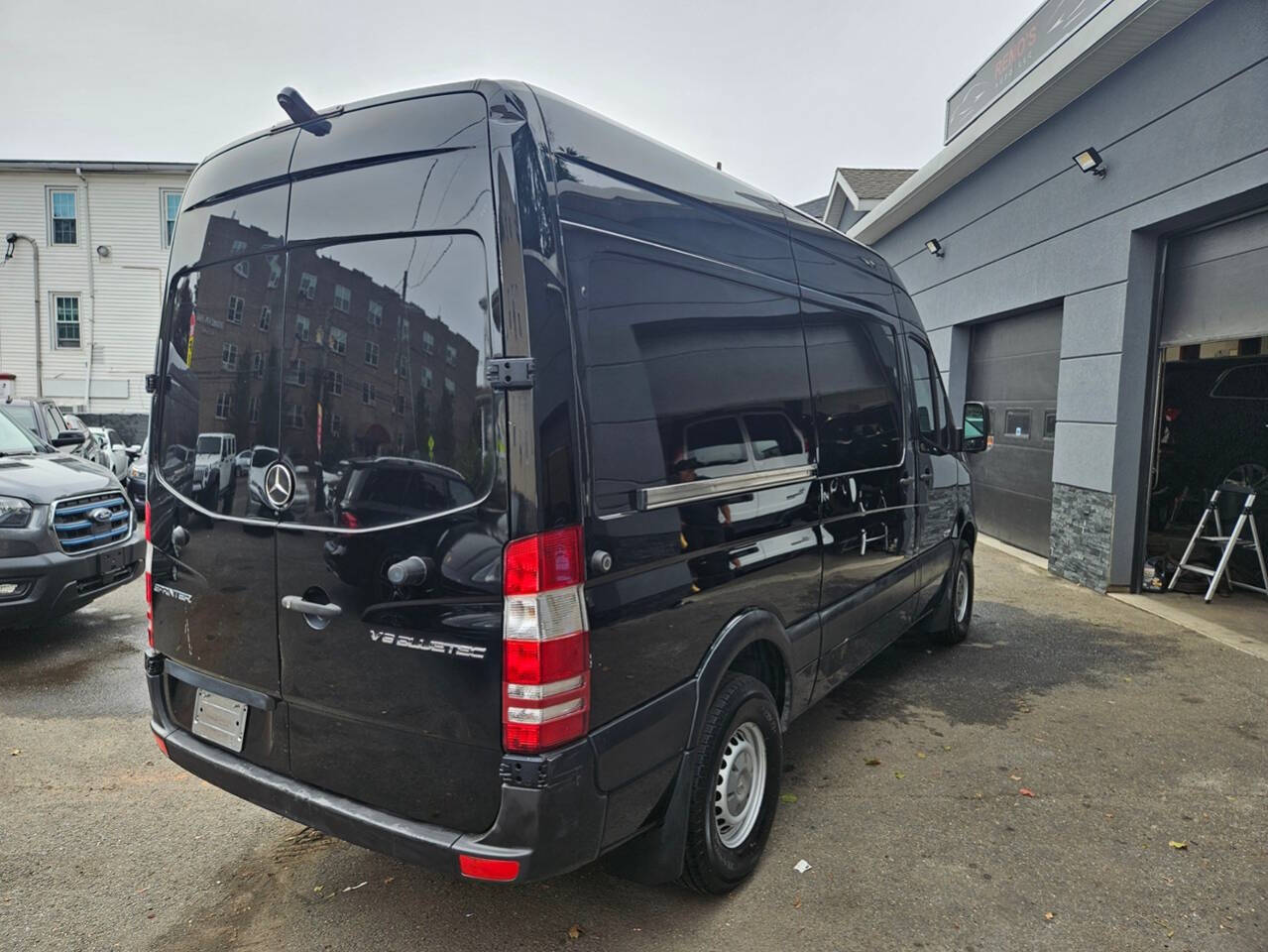 2015 Mercedes-Benz Sprinter for sale at RENOS AUTO SALES LLC in Waterbury, CT