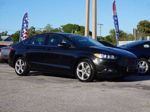 2015 Ford Fusion for sale at Sunny Florida Cars in Bradenton FL