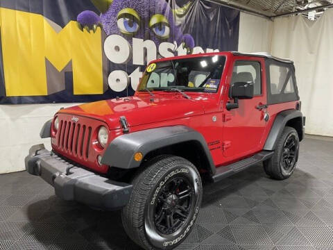 2014 Jeep Wrangler for sale at Monster Motors in Michigan Center MI