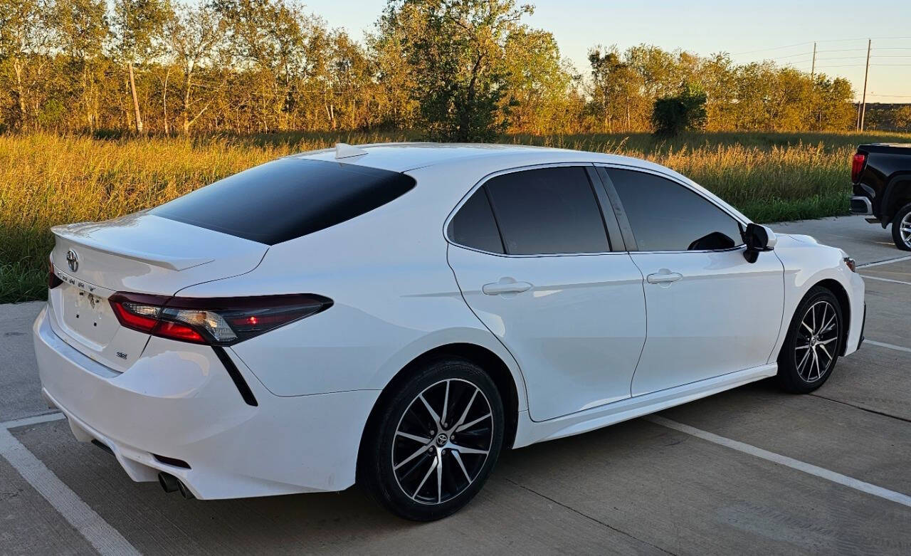 2021 Toyota Camry for sale at CAR MARKET AUTO GROUP in Sugar Land, TX