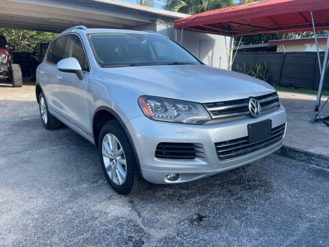 2014 Volkswagen Touareg for sale at America Auto Wholesale Inc in Miami FL