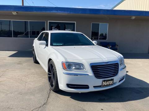 2014 Chrysler 300 for sale at AUTO NATIX in Tulare CA