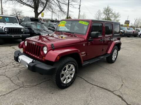 2013 Jeep Wrangler Unlimited for sale at Dean's Auto Sales in Flint MI