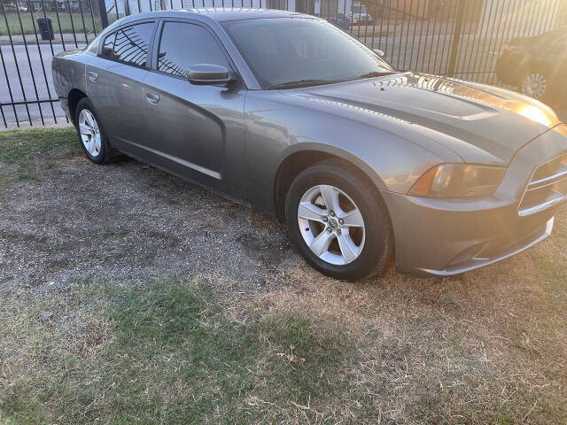 2012 Dodge Charger for sale at Affordable Quality Motors LLC in Houston, TX