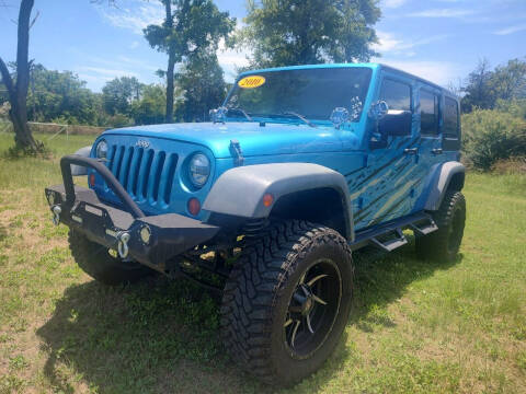 2010 Jeep Wrangler Unlimited for sale at LA PULGA DE AUTOS in Dallas TX