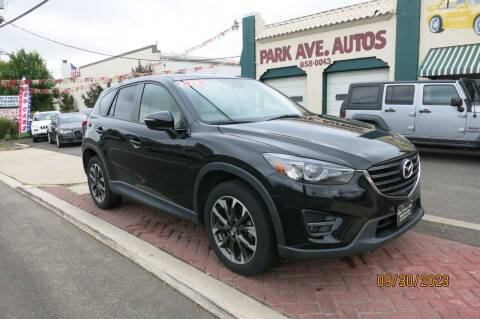 2016 Mazda CX-5 for sale at PARK AVENUE AUTOS in Collingswood NJ