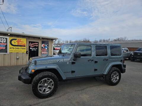 2015 Jeep Wrangler Unlimited for sale at CarTime in Rogers AR