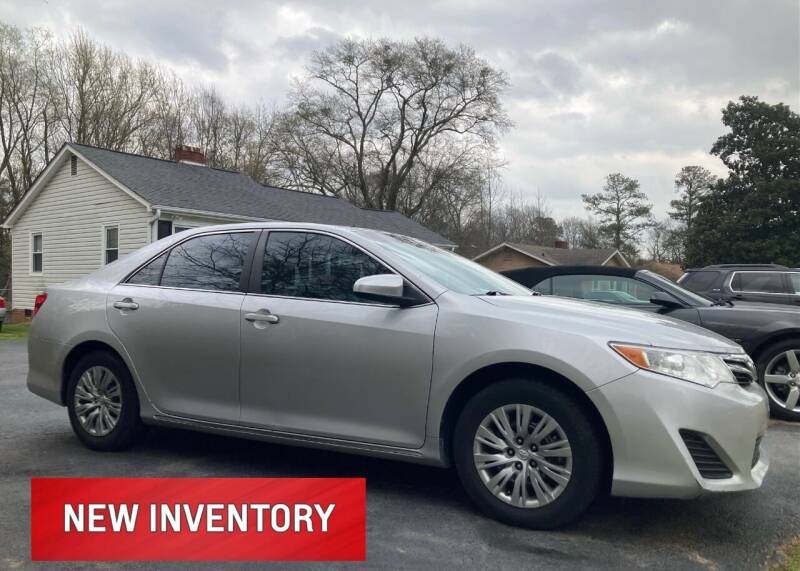 2014 Toyota Camry for sale at SIGNATURES AUTOMOTIVE GROUP LLC in Spartanburg SC