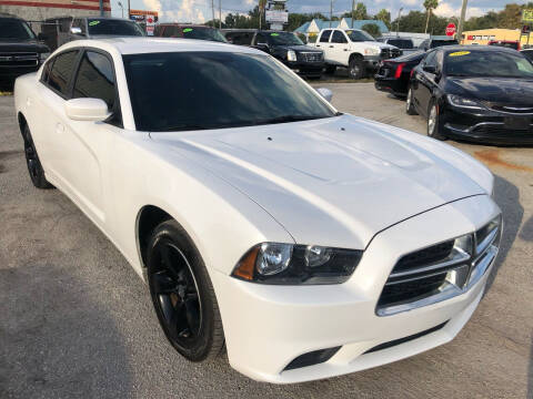 2014 Dodge Charger for sale at Marvin Motors in Kissimmee FL