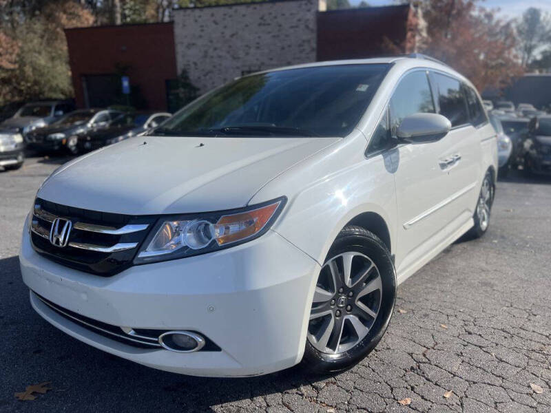 2014 Honda Odyssey for sale at Atlanta Unique Auto Sales in Norcross GA