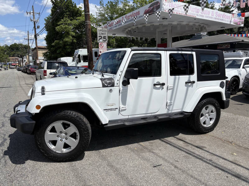 Used 2012 Jeep Wrangler Unlimited Sahara with VIN 1C4HJWEG0CL103186 for sale in Paterson, NJ