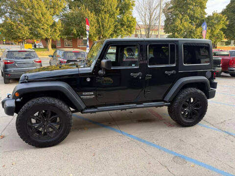 2015 Jeep Wrangler Unlimited for sale at Mulder Auto Tire and Lube in Orange City IA