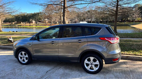 2014 Ford Escape for sale at PRESTIGE OF SUGARLAND in Stafford TX