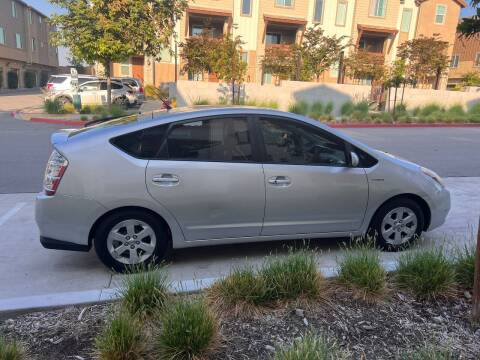 2006 Toyota Prius for sale at E and M Auto Sales in Bloomington CA