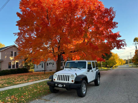 2011 Jeep Wrangler Unlimited for sale at Lake Geneva Motors LLC in Lake Geneva WI