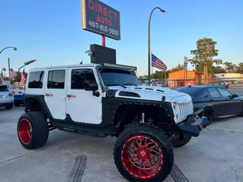 2014 Jeep Wrangler Unlimited for sale at Direct Auto in Orlando FL
