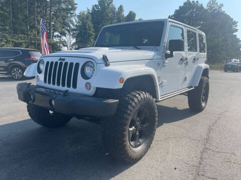 2015 Jeep Wrangler Unlimited for sale at Airbase Auto Sales in Cabot AR