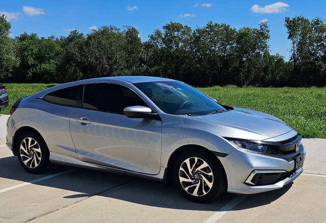 2019 Honda Civic for sale at CAR MARKET AUTO GROUP in Sugar Land, TX