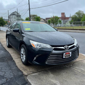 2015 Toyota Camry for sale at A & J AUTO GROUP in New Bedford MA
