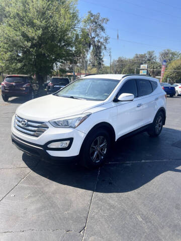 2014 Hyundai Santa Fe Sport for sale at BSS AUTO SALES INC in Eustis FL