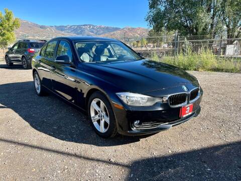 2014 BMW 3 Series for sale at The Car-Mart in Murray UT