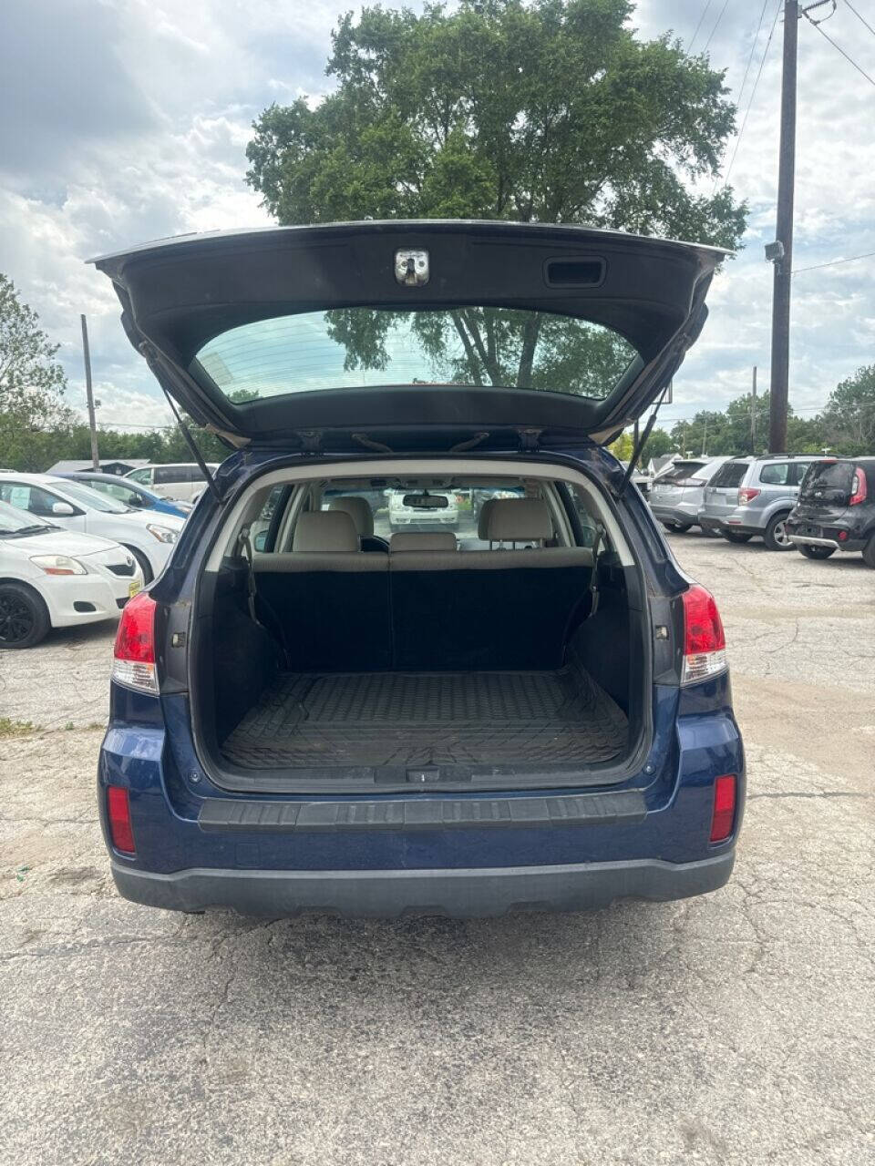 2011 Subaru Outback for sale at Calderon Auto Sales in Des Moines, IA