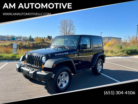 2012 Jeep Wrangler for sale at AM AUTOMOTIVE in Forest Lake MN