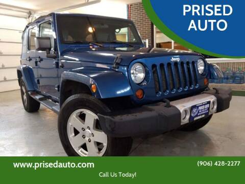 2010 Jeep Wrangler Unlimited for sale at PRISED AUTO in Gladstone MI