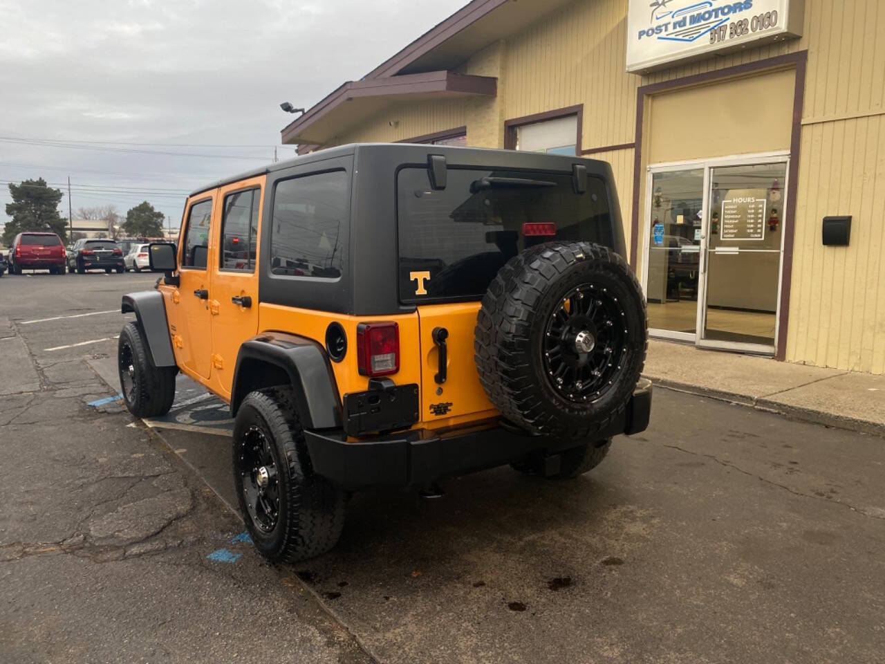 2012 Jeep Wrangler Unlimited for sale at Post Rd Motors in Indianapolis, IN