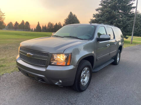 2012 Chevrolet Suburban for sale at BELOW BOOK AUTO SALES in Idaho Falls ID