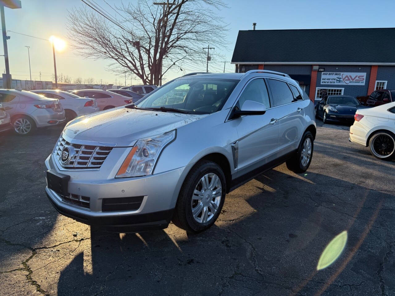 2014 Cadillac SRX for sale at AVS AUTO GROUP LLC in CLEVELAND, OH