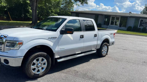 2014 Ford F-150 for sale at AMG Automotive Group in Cumming GA