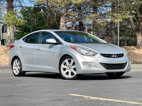 2012 Hyundai Elantra for sale at Used Cars and Trucks For Less in Millcreek UT