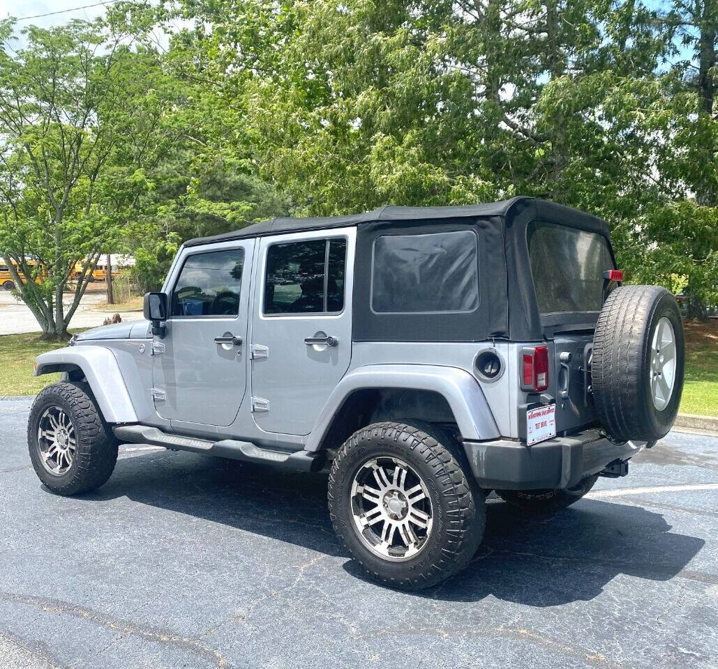 2013 Jeep Wrangler Unlimited for sale at International Car Service, Inc in DULUTH, GA