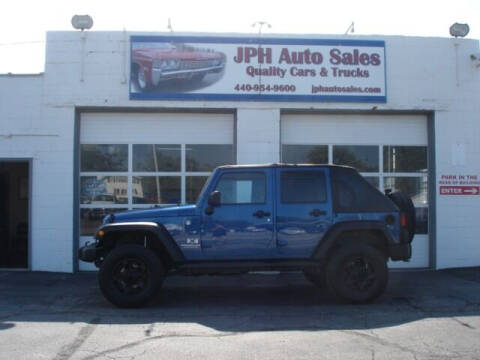 2009 Jeep Wrangler Unlimited for sale at JPH Auto Sales in Eastlake OH