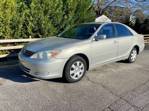 2003 Toyota Camry for sale at Front Porch Motors Inc. in Conyers GA