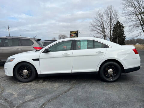 2013 Ford Taurus for sale at Claborn Motors, INC in Cambridge City IN