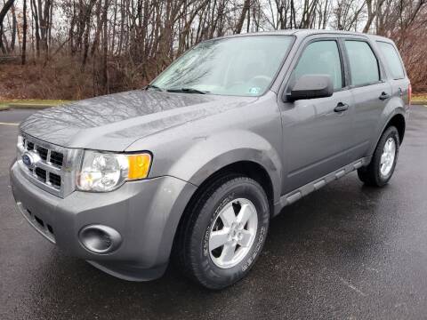 2011 Ford Escape for sale at Spectra Autos LLC in Akron OH