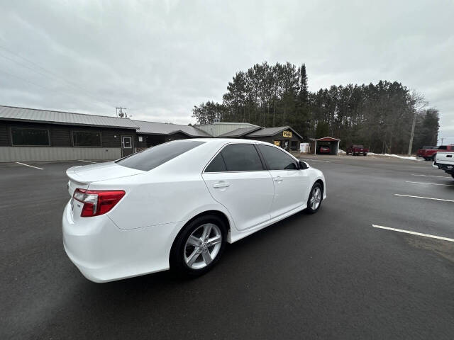 2014 Toyota Camry for sale at Auto Hunter in Webster, WI