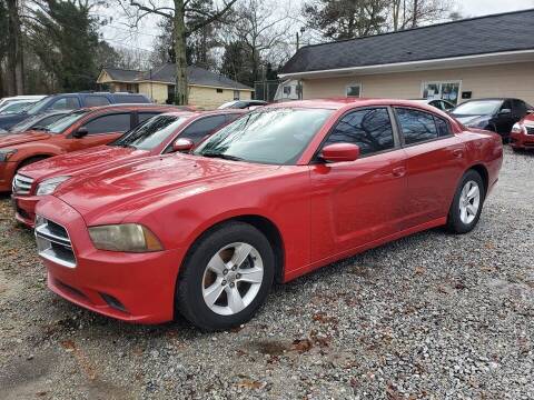 2012 Dodge Charger for sale at Dealmakers Auto Sales in Lithia Springs GA