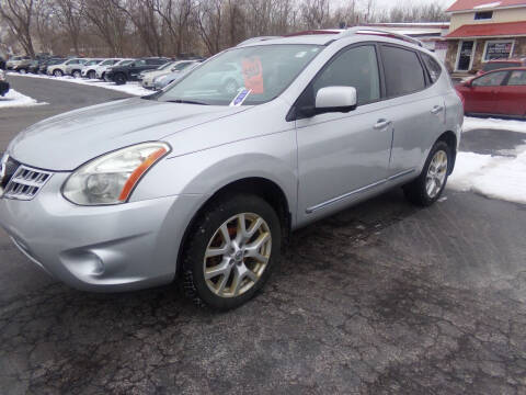 2012 Nissan Rogue for sale at Pool Auto Sales Inc in Spencerport NY