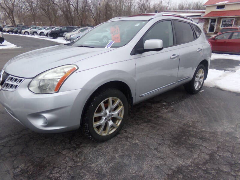 2012 Nissan Rogue for sale at Pool Auto Sales Inc in Spencerport NY