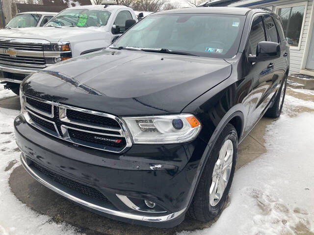 2015 Dodge Durango for sale at Chuckie Bizzarro's Fleetwing Auto in Erie, PA