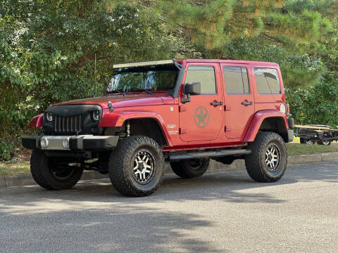 2011 Jeep Wrangler Unlimited for sale at H and S Auto Group in Canton GA