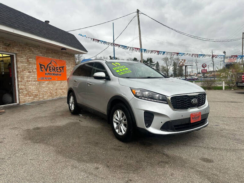 Used 2019 Kia Sorento LX with VIN 5XYPGDA31KG554168 for sale in Austintown, OH